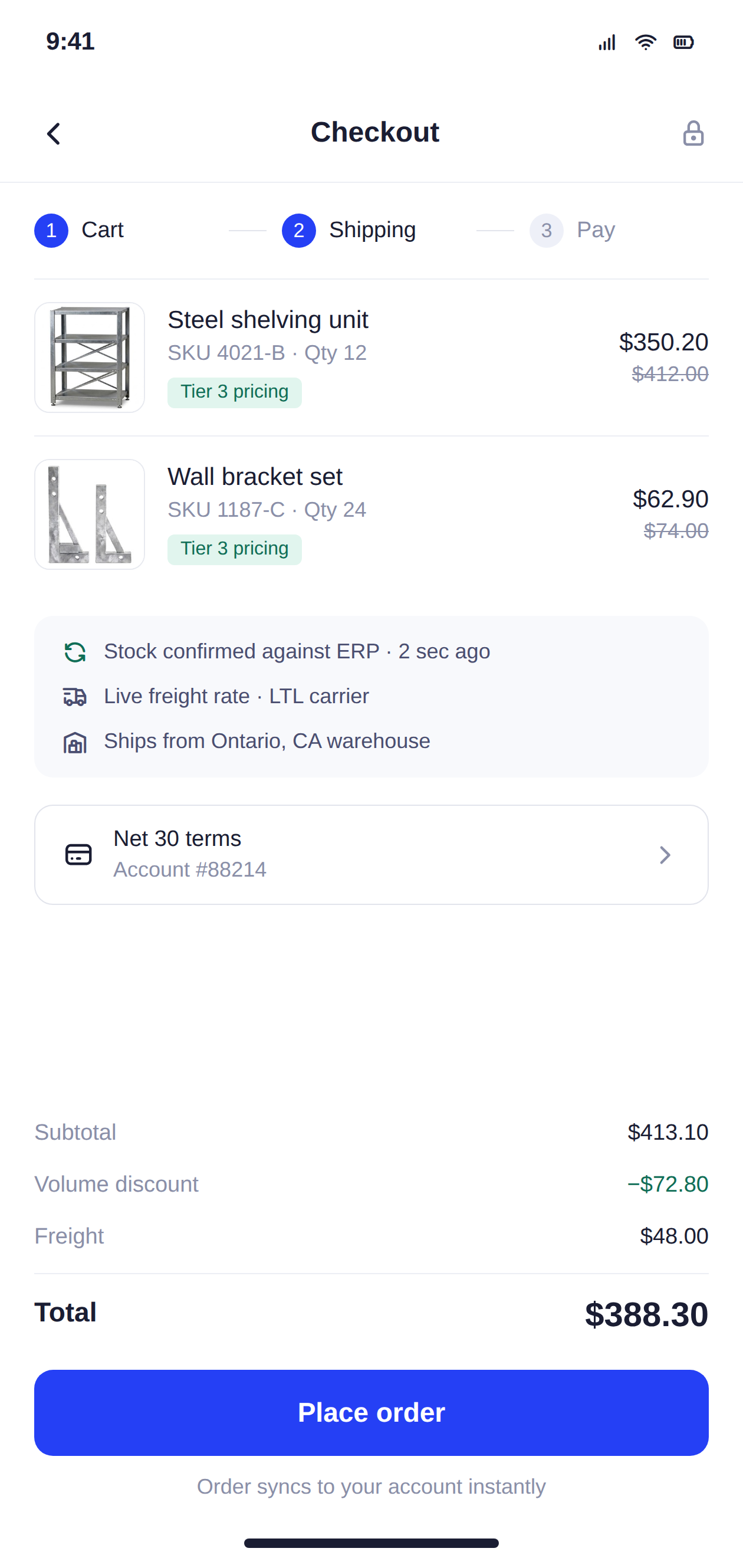 A custom B2B checkout showing tier pricing, ERP stock confirmation, live freight rates and Net 30 terms